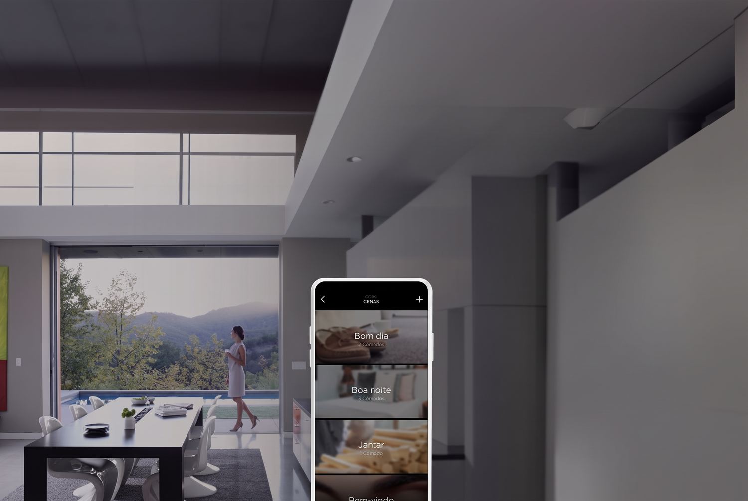 Casa ampla com o app Savant mostrando as cenas Bom dia, Boa noite e Jantar